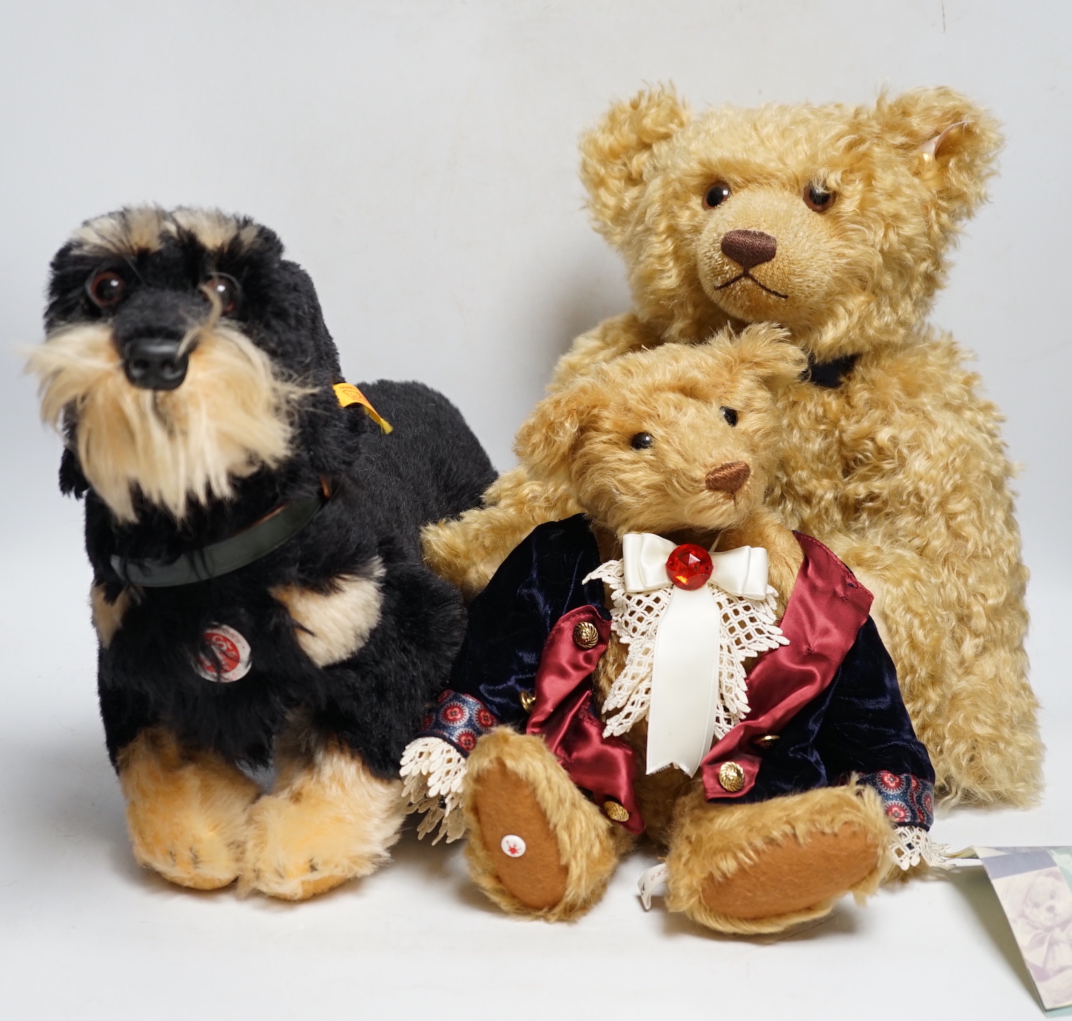 A Steiff 1902 2002 edition white tag, Steiff 'Raudi' dachshund and Sigikid German bear